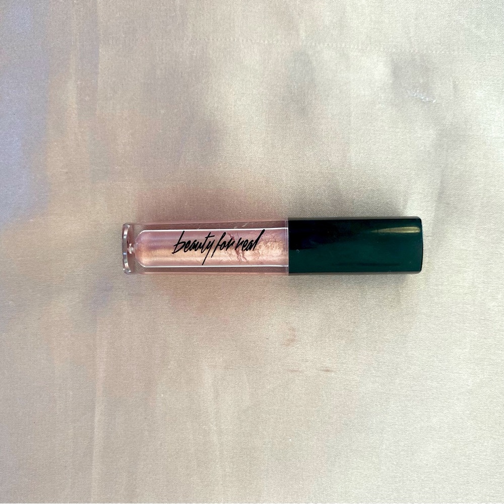 6/$40 or 9/$50 Beauty For Real Lipgloss in shade “Starlust”